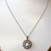 Load image into Gallery viewer, Beaded charm pendant with blue topaz center piece and mandala of larimar and carnelian with metallic steel micro-beading.